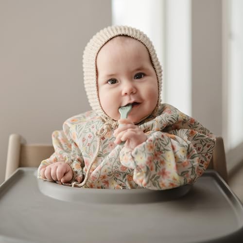 mushie Long Sleeve Baby Bib | Water Resistant Adjustable Fit - color: Pastel Blooms