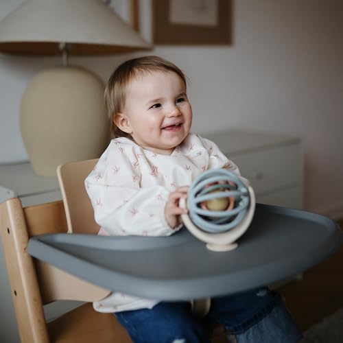 mushie Long Sleeve Baby Bib | Water Resistant Adjustable Fit - color: Bows