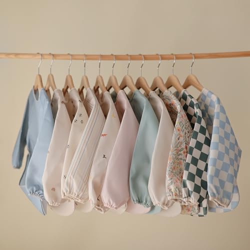 mushie Long Sleeve Baby Bib | Water Resistant Adjustable Fit - color: Bows