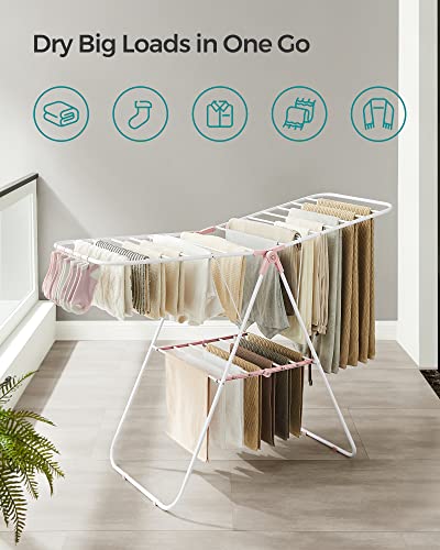 SONGMICS Clothes Drying Rack, Foldable Space-Saving Laundry Drying Rack - color: White + Pink, size: 1 Tier （21.7"d x 58.3"w x 39.4"h）
