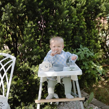 mushie Long Sleeve Baby Bib | Water Resistant Adjustable Fit - color: Olive Check